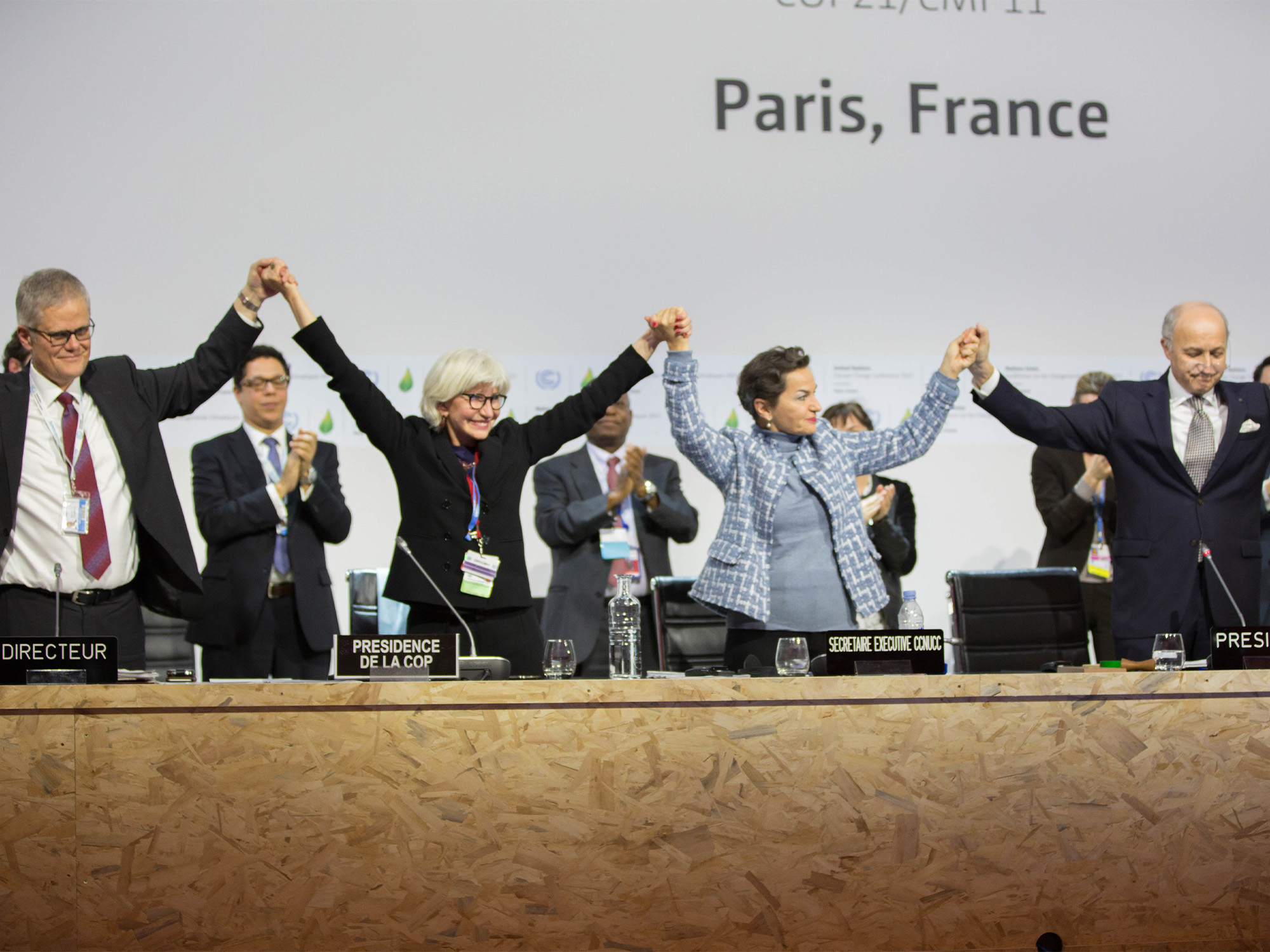 Policymakers at the creating of the Paris Agreement.